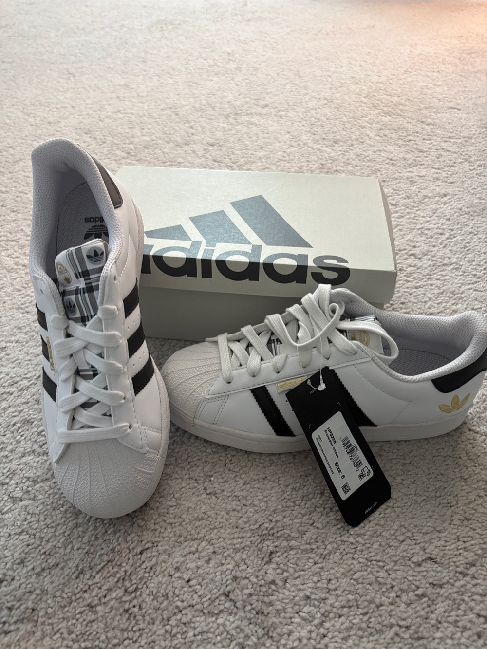 adidas White and Black Superstar Sneakers with Gold Trefoil